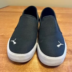 Womens black puma slip ons
